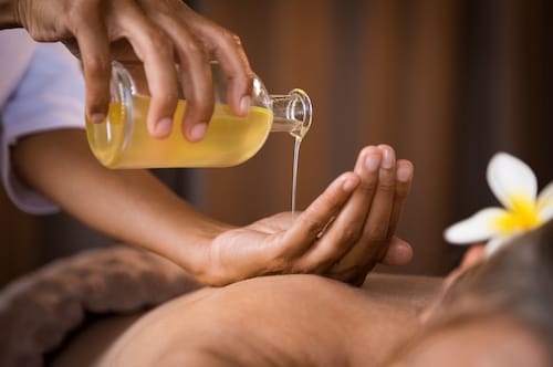Aroma oil on woman back